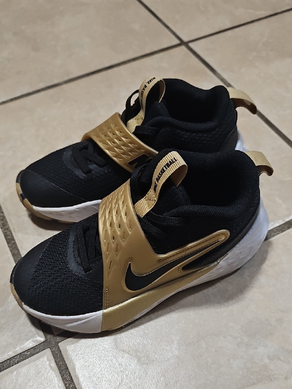 Nike Kids Black and Gold Slip-On Sneakers
